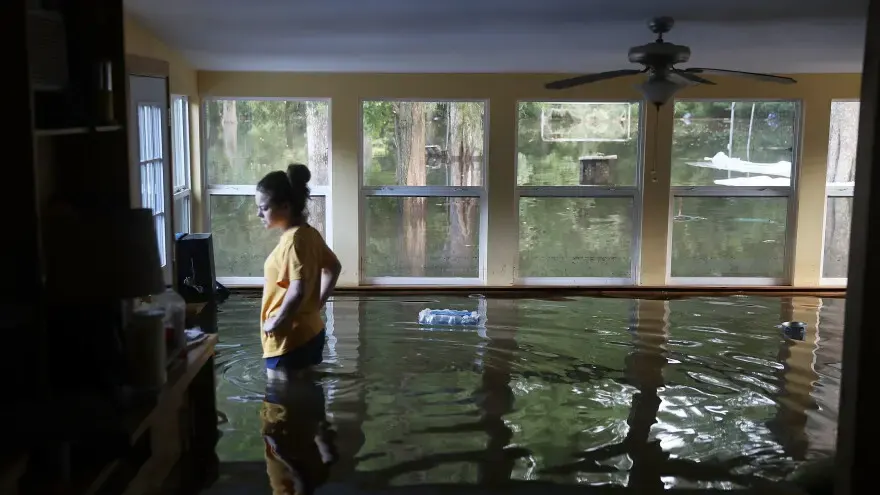 Flood water standing across the ground floor of a Livingston Parish slab home